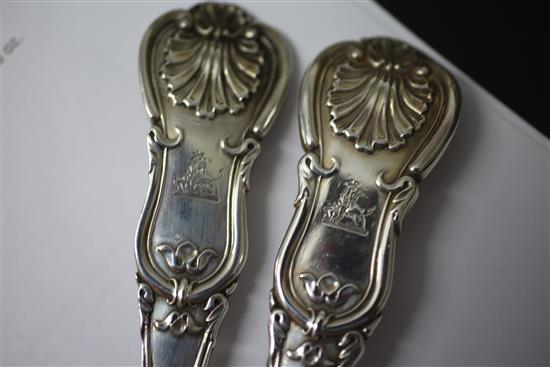 A matched pair of Victorian silver double struck scroll rosette pattern basting spoons, 12.5 oz.